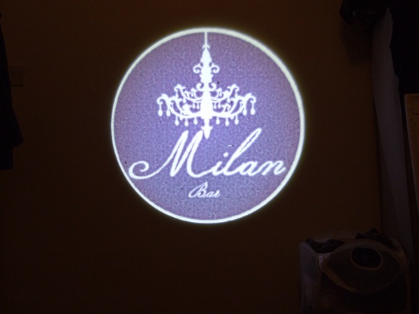 Bar Milan logo projected onto wall