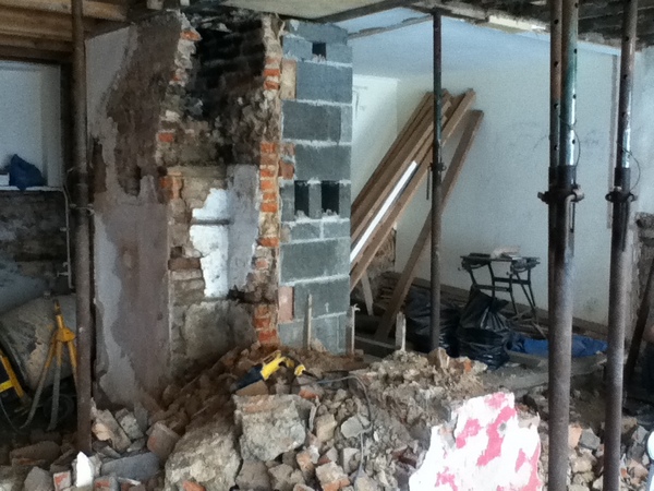 Removing a structural wall and replacing it with an I beam to make the venue more open and spacious